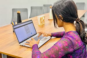IMWI colleague tests the AI-powered groundwater game. Photo: IWMI