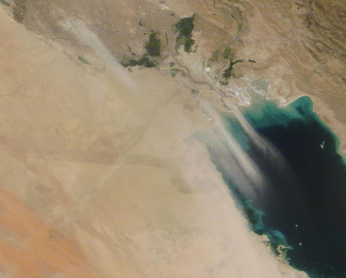 An intense sandstorm turned the skies over Kuwait orange on June 11, 2021, with long, thick plumes of sand stretching over Iraq, Kuwait and the Persian Gulf. Photo: MODIS Land Rapid Response Team, NASA GSFC via Wikimedia Commons