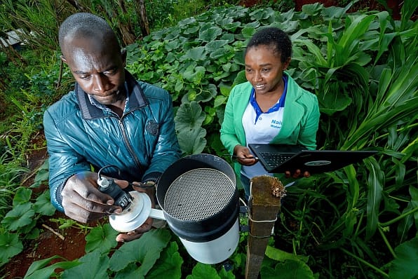 Collecting rainwater data on the farm. Tana River watershed, Kenya. 30 November 2016. Photo: Georgina Smith / CIAT