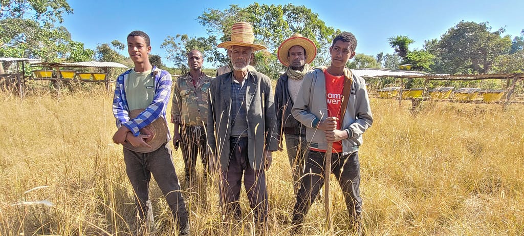 Abamalabe (middle) with beekeepers. Great Rift Valley, Ethiopia. Photo by Tirusew Teshale