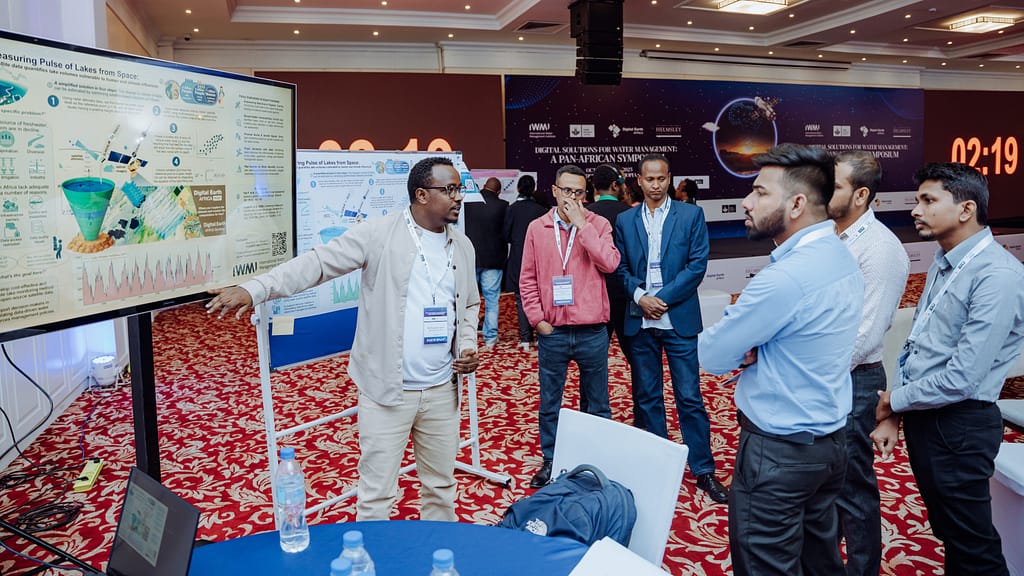 Wegayehu Asfaw from Ethiopia describes how they measure the pulse of water in Lake Tana using satellites. “Measuring the Pulse of Lakes from Space” captured how satellites have become essential tools for tracking the health of African lakes. The presentation was part of the DIWASA creative poster competition on the theme “Human side of digital innovations. Photo: IWMI
