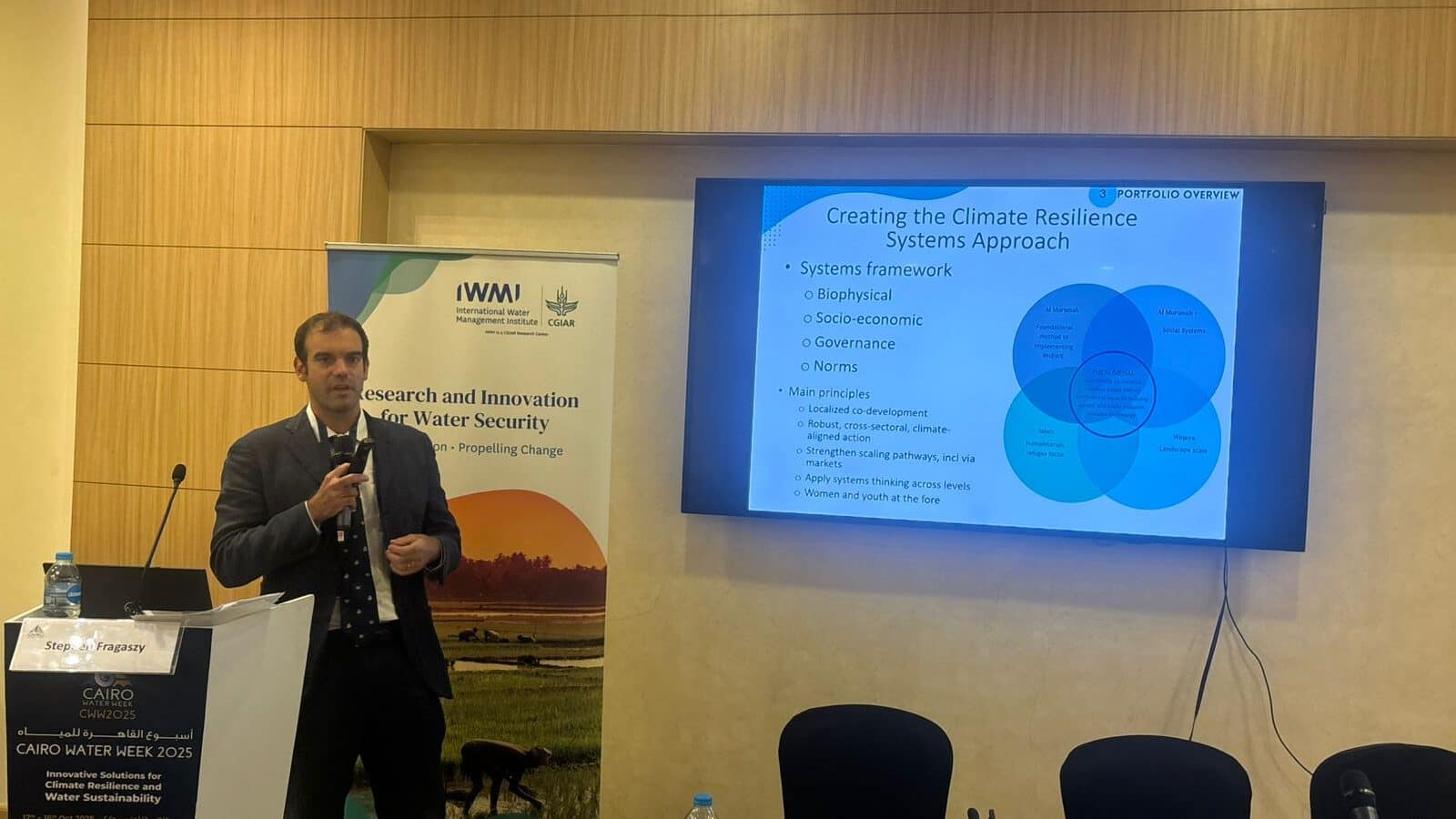 Stephen Fragaszy presents slides on scaling up nature-based solutions in the MENA region. Photo: Nada Al-Tantawi/ IWMI