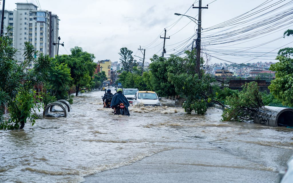 People's daily lives were disrupted due to heavy rainfall and flooding in Kathmandu during July 2024. Photo: AP Tolang