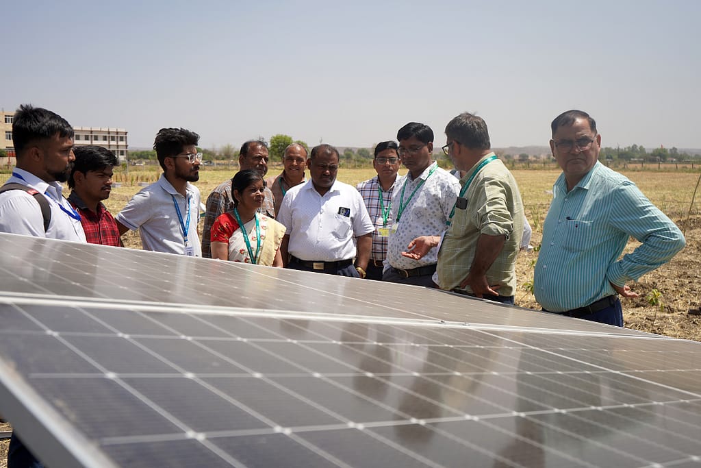 IWMI researcher Deepak Varshney explained solar pump schemes in India and their benefits to visitors at the IWMI stall during the Unnat Krishi Mahotsav 2026 in Raisen, Madhya Pradesh. Photo: IWMI