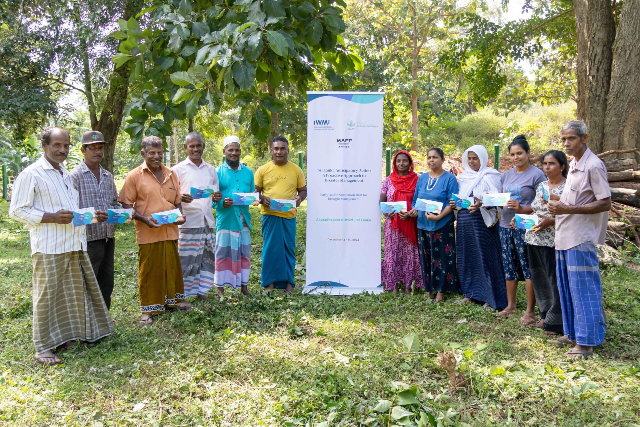 Participants in the anticipatory action simulation. Photo credit: Pradeep Liyanage / IWMI