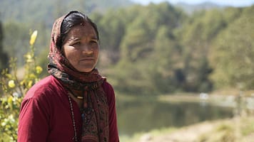 Dharma Devi Bhandari, a resident of Chhatiwan, reflects on changes in agricultural productivity and water availability observed over generations. Photo: Sunny Deshar/IWMI