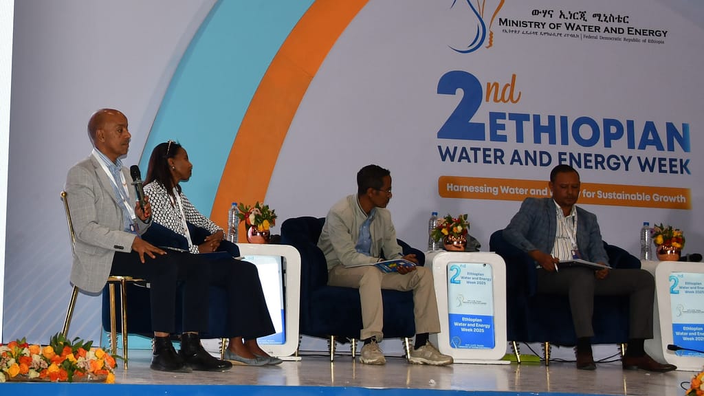 Abdulkarim Seid, left, IWMI’s country and East Africa regional representative, facilitates a dialogue among government officials, private sector representatives and development partners on strengthening water–energy–food–ecosystem synergies during the second Ethiopian Water and Energy Week. Photo: Elizabeth Wamba/IWMI.”
