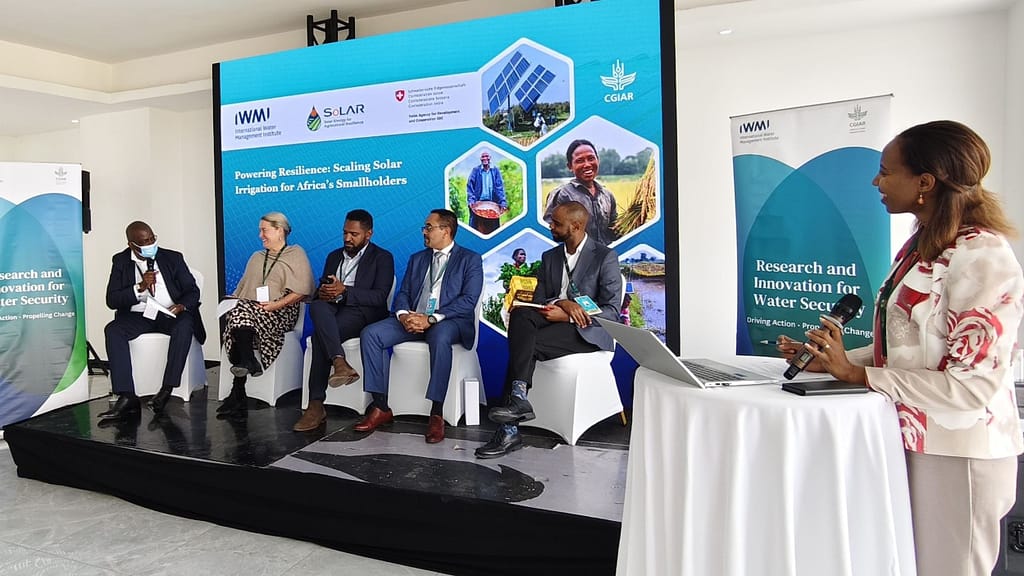 Meron Teferi Taye, standing right, moderates a panel discussion on scaling solar irrigation during the African Climate Summit 2025. Photo: Elizabeth Wamba/IWMI