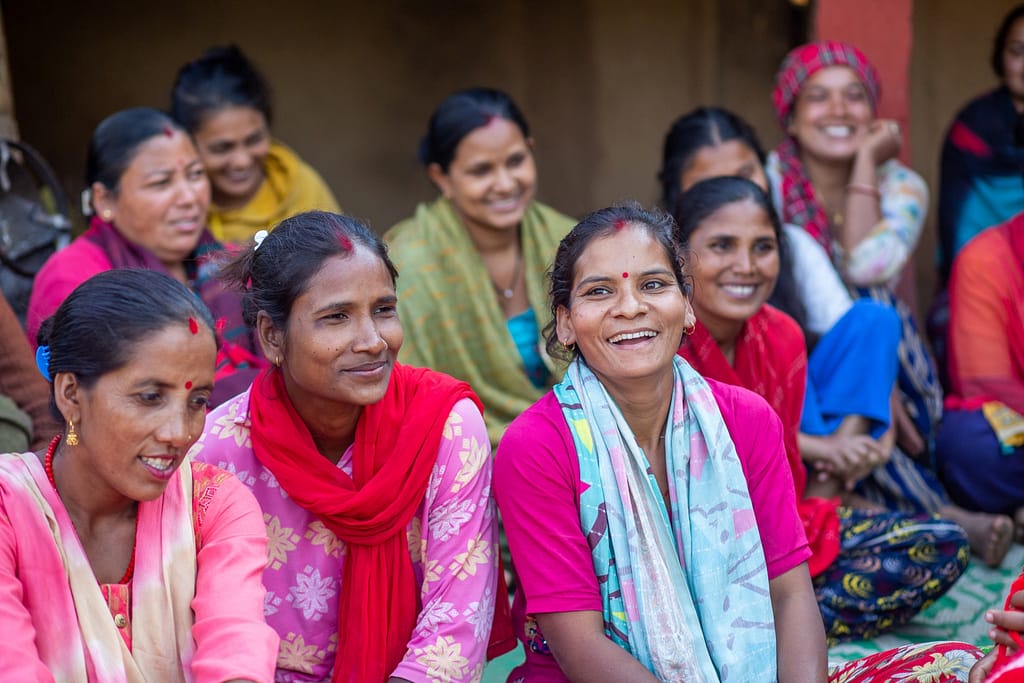 Women in Gorbakot Municipality, Nepal, discuss farming challenges amid shifting labor patterns. Photo: Nabin Baral for IWMI