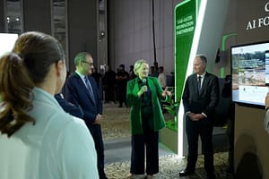 International Water Management Institute Deputy Director General Rachael McDonnell (left) and Director General Mark Smith (right) talk to attendees at the CGIAR AI Hub booth at the AI Agriculture Ecosystem Launch in Abu Dhabi on December 08, 2025. Photo: CGIAR