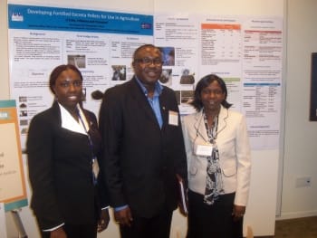 IWMI's Josiane Nikiema (left) and Olufunke Cofie (right) flanking Hon. Mr Samuel Ofosu-Ampofo, the Ghanaian Minister for Local Government and Rural Development at the Reinvent the Toilet Fair in Seattle.