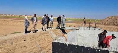 Community members, IWMI staff, and local contractors during a site visit to the Maysan Constructed Wetland in southern Iraq (2024). The visit included inspection of the treatment structures under construction and discussions on community-led management of wastewater reuse systems. Photo: Mohamed Tawfik/ IWMI
