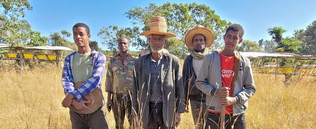 Abamalabe (middle) with beekeepers. Great Rift Valley, Ethiopia. Photo by Tirusew Teshale