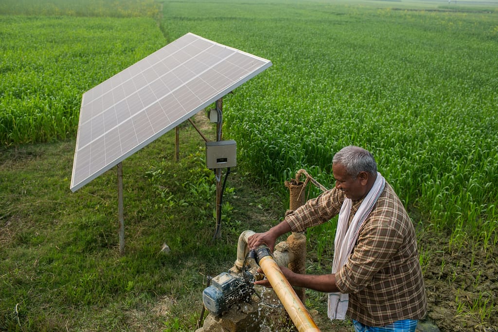 Fish and crop farmer Bhupendra Mahato Koire uses solar irrigation on his 2.5 bigha fish pond and farmland in Masedwa Village, Nepal. Photo: Nabin Baral for IWMI