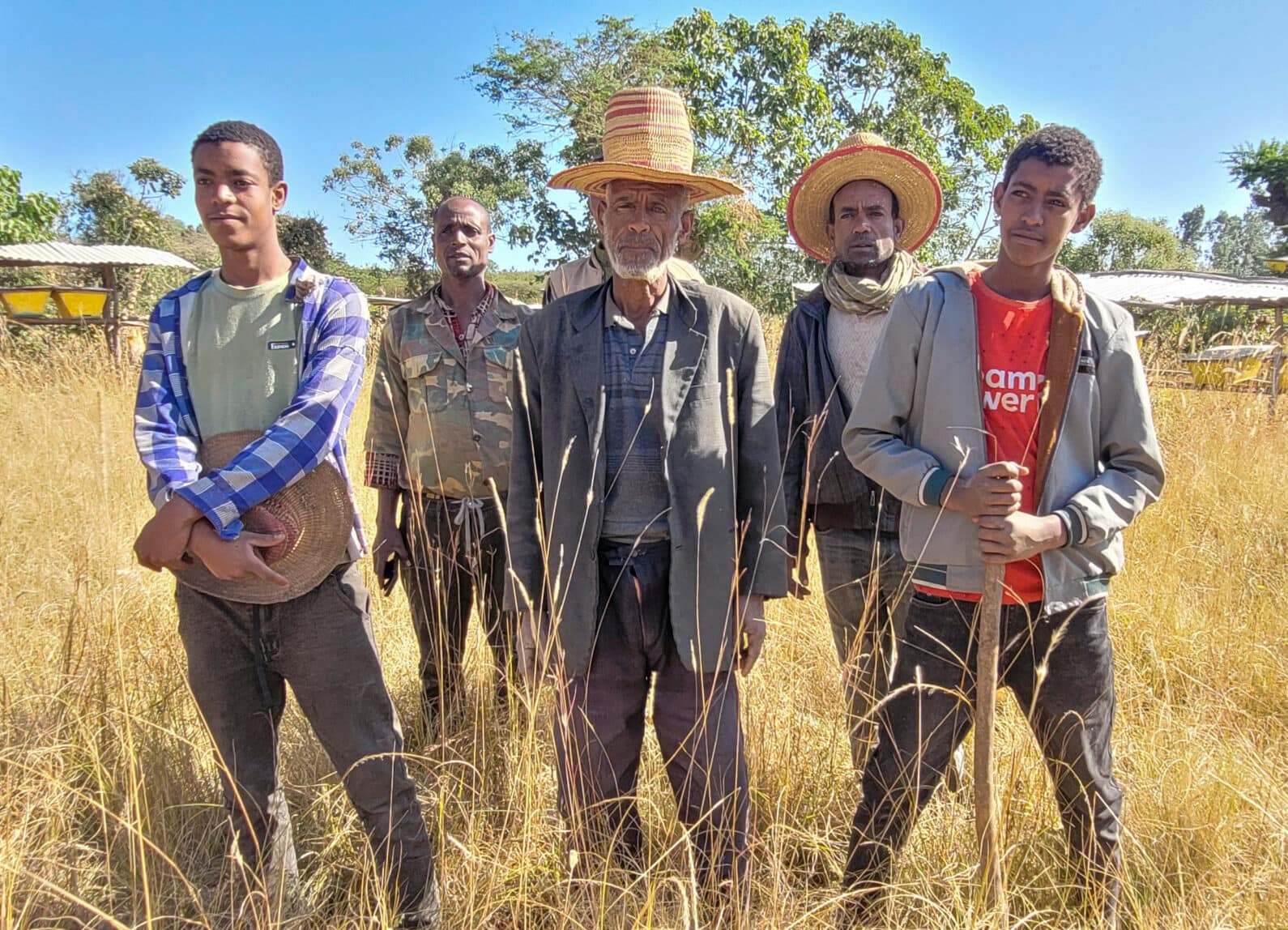 Abamalabe (middle) with beekeepers. Great Rift Valley, Ethiopia. Photo by Tirusew Teshale