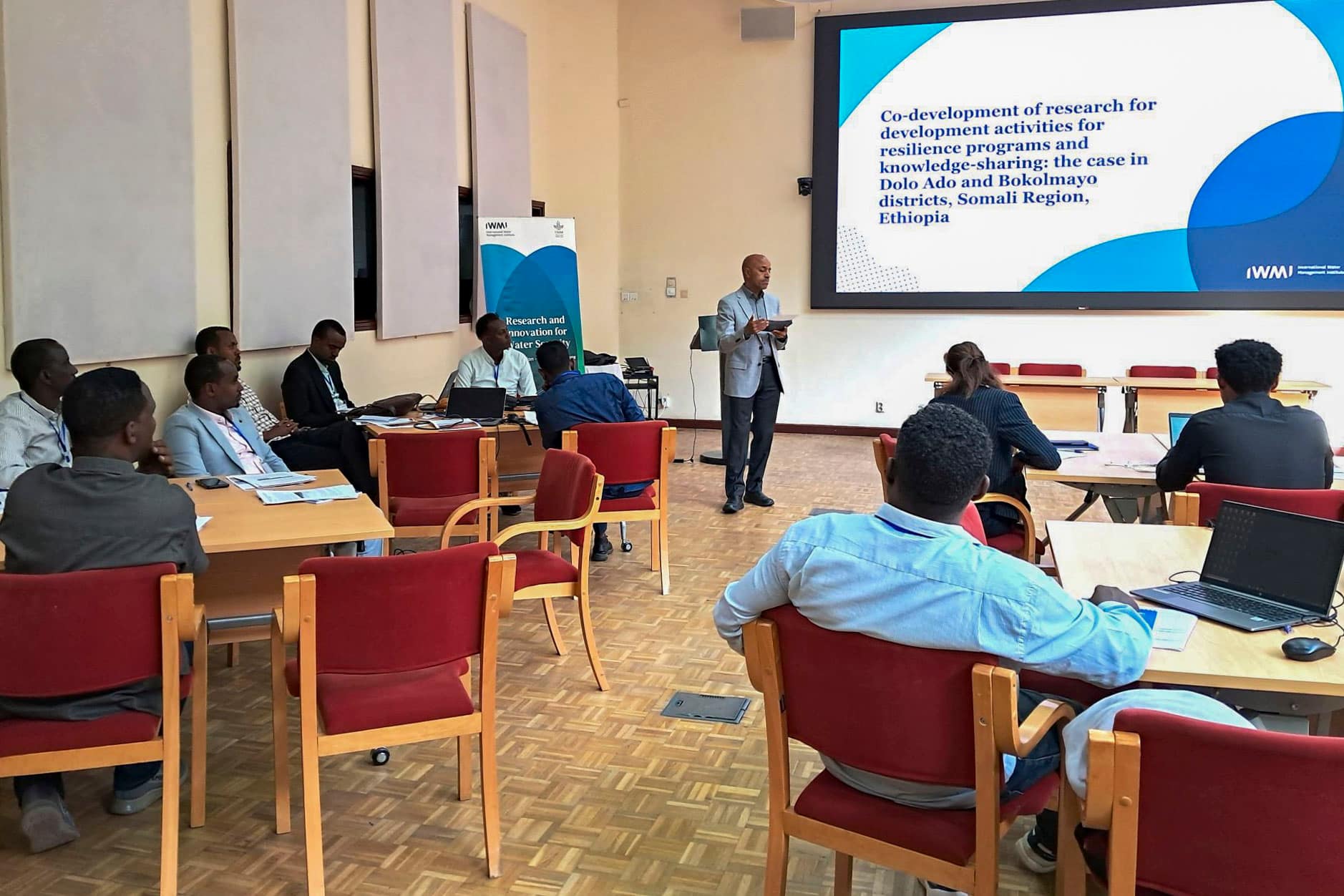 IWMI's Abdulkarim Seid gives remarks at a resilience co-design workshop in Addis Ababa, Ethiopia. Photo: Elizabeth Wamba/IWMI