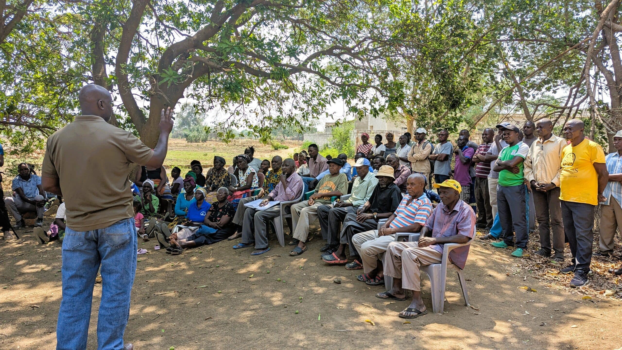 Extension Officer Edward Sichivula cautioning farmers to prepare for the risks that come with increased rainfall. Photo: Agrey Wapamesa /IWMI