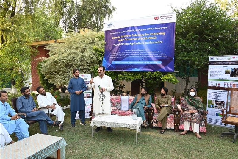 IWMI researchers conduct community consultations with farmers on efficient water use for irrigation. Photo: Amjad Jamal/IWMI
