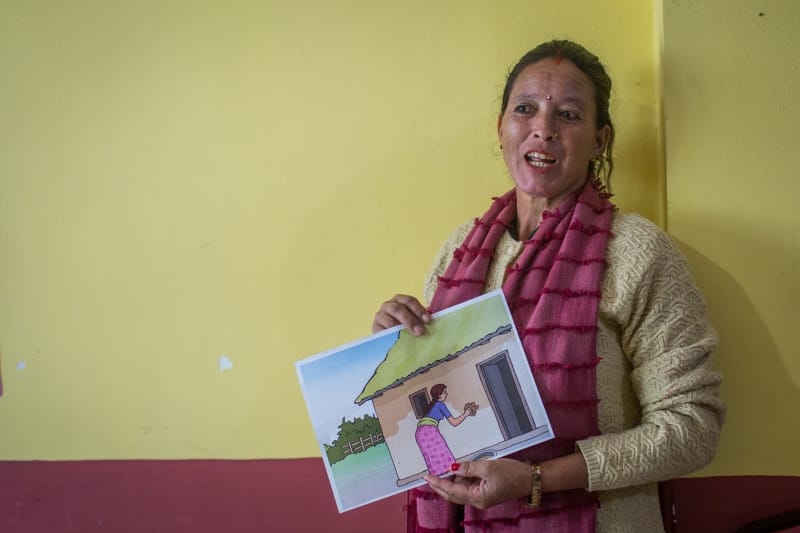 Mina Singh, member of Village Assembly of Dungeshwor Rural Municipality in Dailekh shares her experience about workload of rural women in relation to water & hygiene during the workshop
