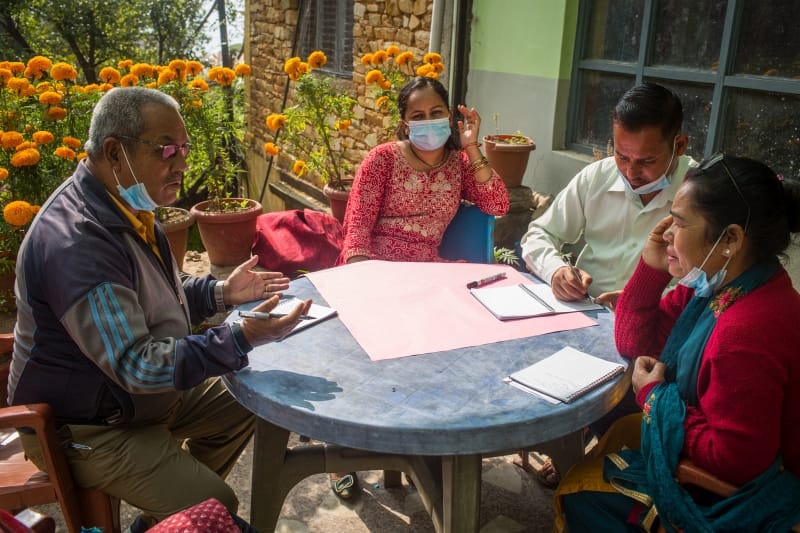 Participants discuss in two groups about the opportunities and challenges for females and male to access and contribute to local water governance in the context of inclusive WASH in their community. This discussion helped the participants to prepare them for the gender -swapping role play that took next as activity 3