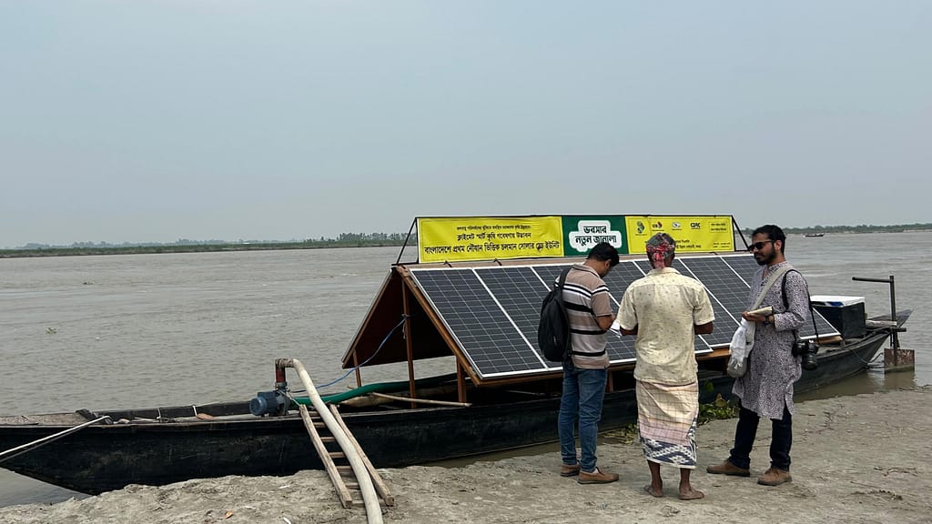 Tanmoy Bhaduri (right), interacting with a solar irrigation service provider at Kayumer char in northern Bangladesh. Photo: NGO Forum for Public Health