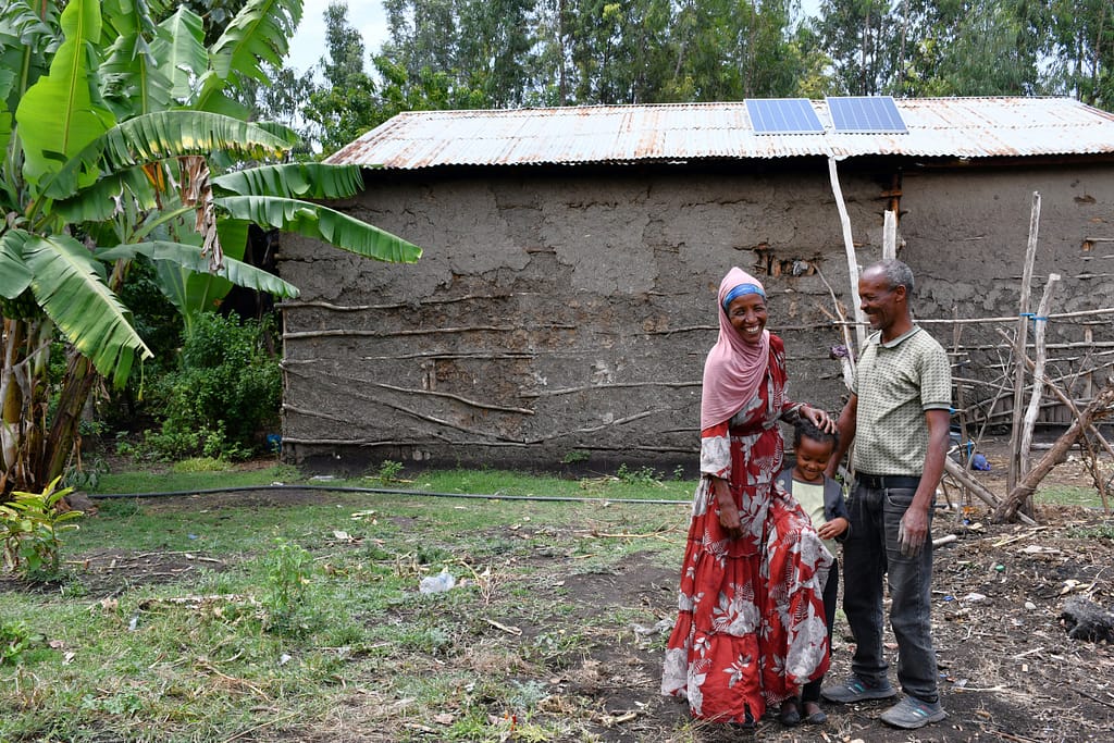 Smallholder farmer Amele Abiyu with part of her family at their field in Misrak Meskan district, Central Region in Ethiopia. Photo: Elizabeth Wamba/IWMI