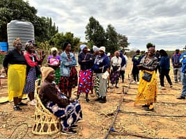 Community village leader Sabina Shonhiwa, standing far right, giving a vote of thanks after a water irrigation exercise. Photo: Seipati Mokhema/IWMI