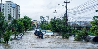 People's daily lives were disrupted due to heavy rainfall and flooding in Kathmandu during July 2024. Photo: AP Tolang