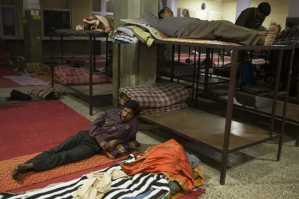 Workers  in a night shelter in Nizammundin, Delhi. During the dry season, Mohammed Arif works as a daily wage laborer in construction and as a rag picker. Migrant work is often sporadic and unpredictable, but every year he managesto save up to Rs 40,000 (USD600) to support his family at home. Photo: Ruhani Kaur