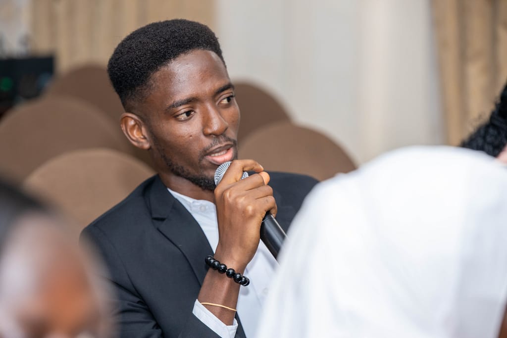 David Quaye, a student of the University of Ghana's Centre for Migration Studies, speaking at the students’ graduation ceremony. Photo: CliqNii Multimedia for IWMI