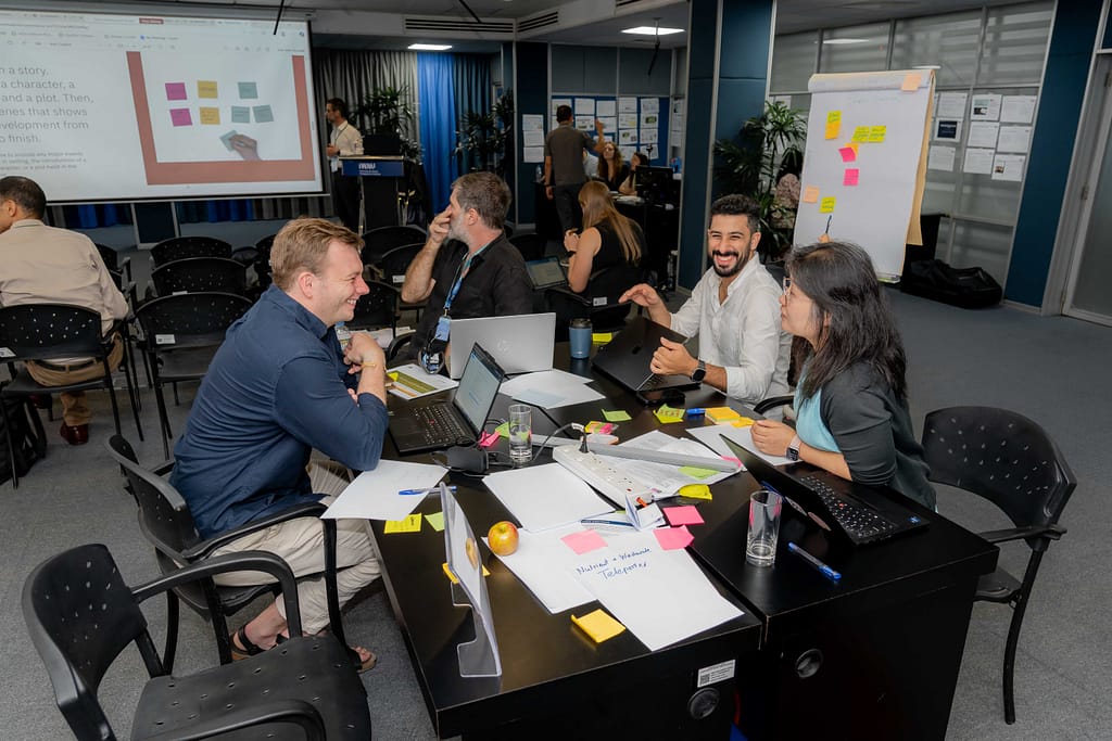 Colleagues from the International Food Production Research Institute, WorldFish, and the International Water Management Institute collaborate together. Photo: Gunarathna Thisal/ Mantaray Films