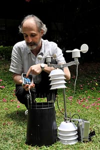 IWMI’s Yann Chemin holds a prototype of the mobile weather station ( Photo: Neil Palmer/ IWMI).