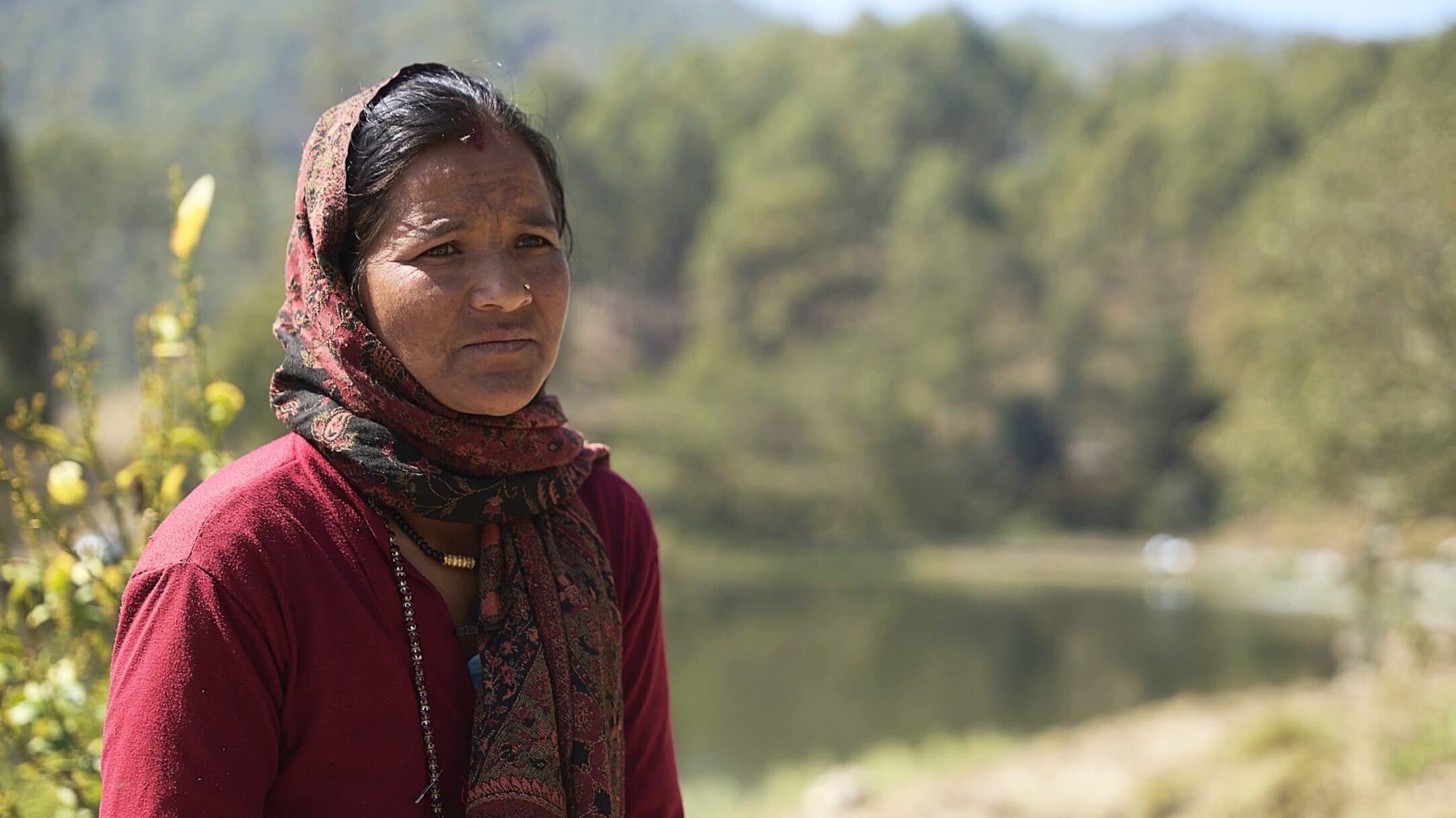 Dharma Devi Bhandari, a resident of Chhatiwan, reflects on changes in agricultural productivity and water availability observed over generations. Photo: Sunny Deshar/IWMI