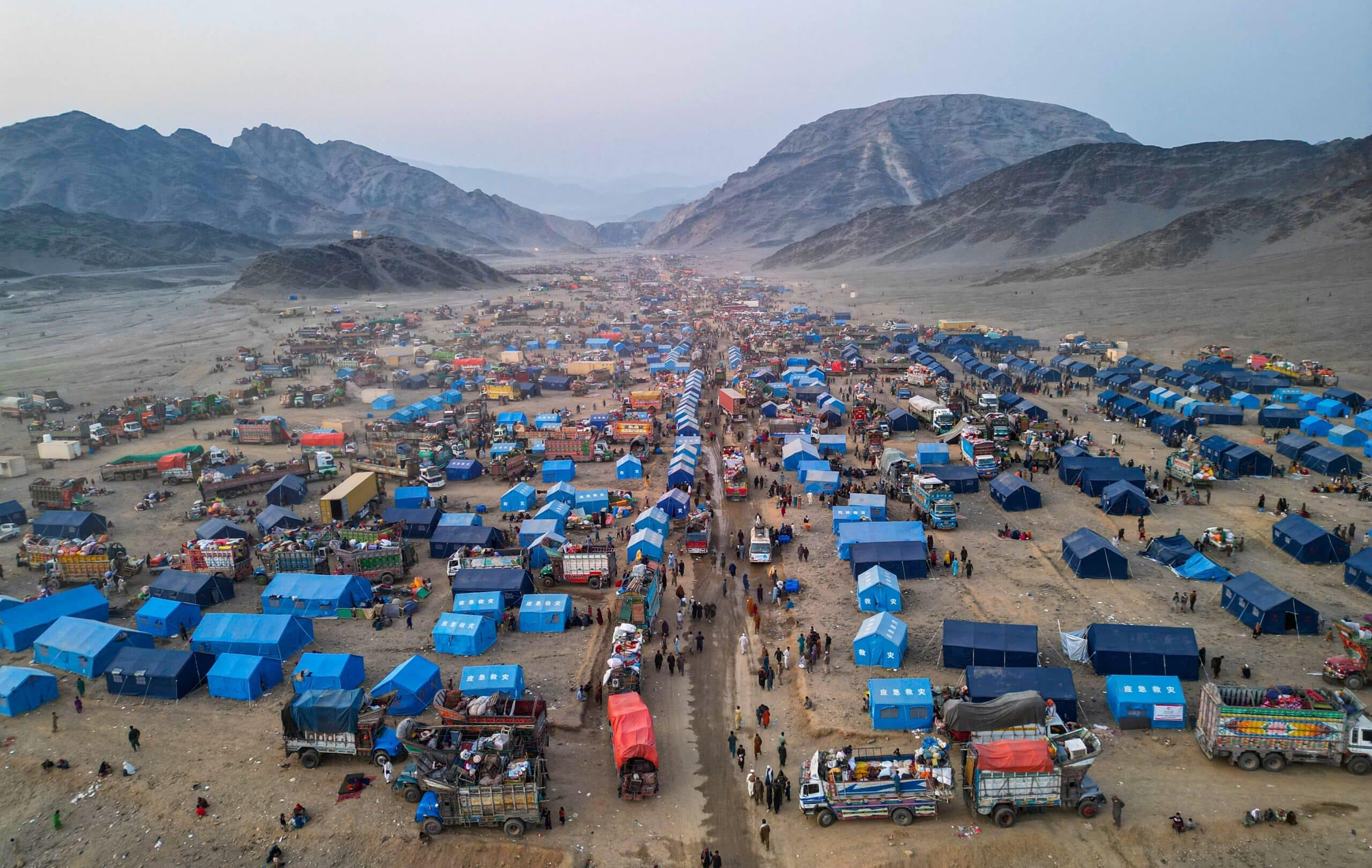 Afghan refugees are seen from above as they return from Pakistan through the Torkham border crossing in Nangarhar Province, Afghanistan, in November 2023. Photo: Waheedullah Jahesh/Shutterstock