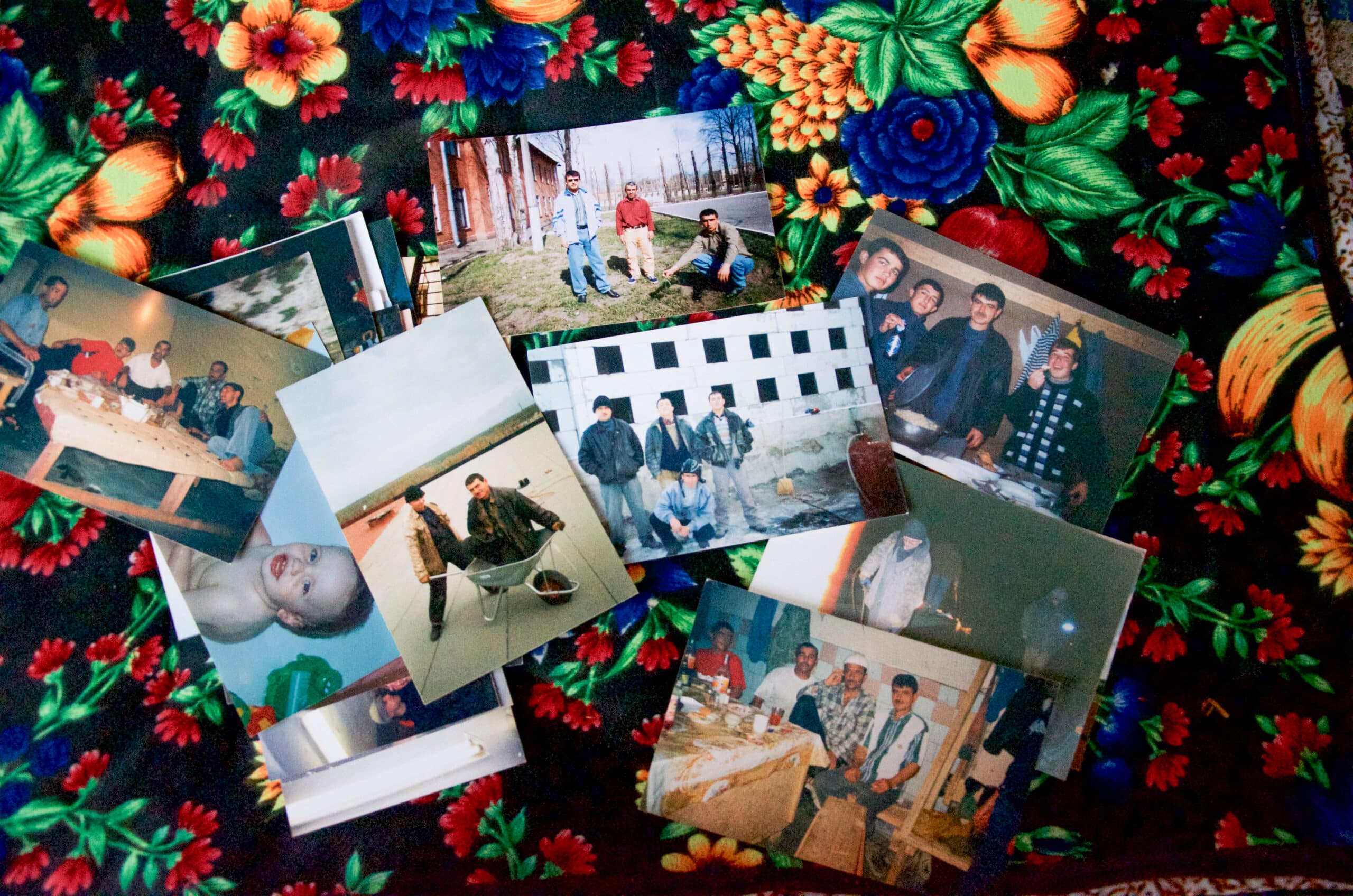 Migrant family members in Tajikistan are remembered at home through their photos. Photo: Madeline Dahm/IWMI