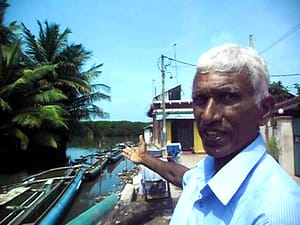 K. Sebastian, teacher by day, stake net fisherman by night, laments the destruction of the canal by rubbish and sewage