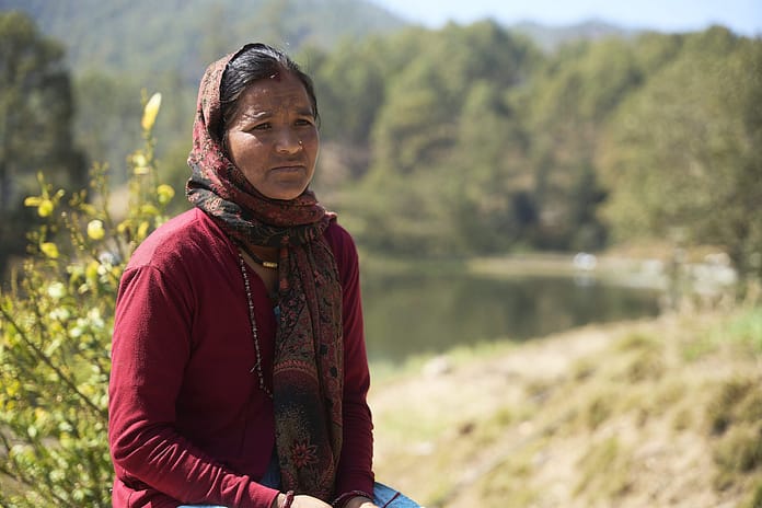 Dharma Devi Bhandari, a resident of Chhatiwan, reflects on changes in agricultural productivity and water availability observed over generations. Photo: Sunny Deshar/IWMI